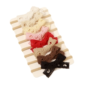 7-piece set of lace hollow bow infant headbands with high-elastic nylon bands in multi-colors