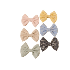 Lot de 6 barrettes nœuds brodés avec motifs marguerites et bordures en dentelle colorées