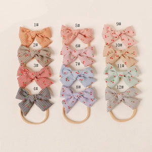 Lot de 12 bandeaux en nylon pour bébé avec motifs à carreaux cerises et nœuds doux