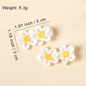 Set of 2 crochet daisy hair clips with white lace petals and yellow flower centers for girls
