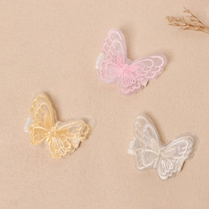 Tre fermagli per capelli a farfalla in organza ricamata per bambini in rosa, giallo e bianco