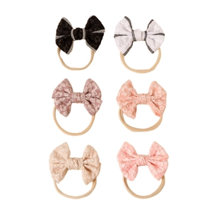 6-pack set of baby nylon headbands with cute floral jacquard bows in assorted soft colors