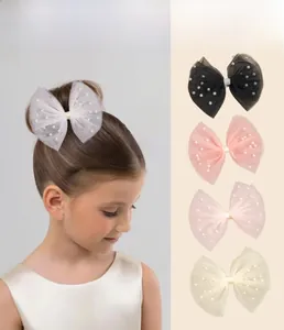 Vue détaillée de barrettes à nœuds en tulle avec perles pour enfants en quatre couleurs