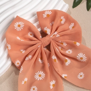 Korallorangene Chiffon-Haarschleife mit Gänseblümchen-Print und langen Bändern für Mädchen