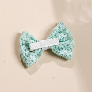 Mint green lace bow hair clip for girls with floral embroidery and wrapped safety clip