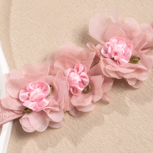 Rosa Baby Stirnband aus Stoff mit drei Netzblumen und elastischem Seidenband