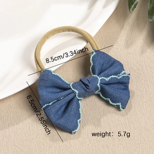 Blue denim bow baby headband with wave stitching on soft elastic nylon strap