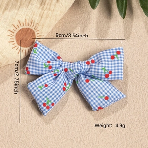 Blue and white plaid bow hair clip with red cherry print and sweet pastoral summer style