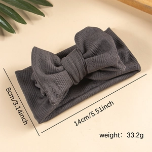 Grey knit infant headband with large double-layered bow and elastic wide ribbed design