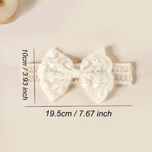 Bandeau bébé en dentelle crème avec nœud papillon et broderies florales pour enfants