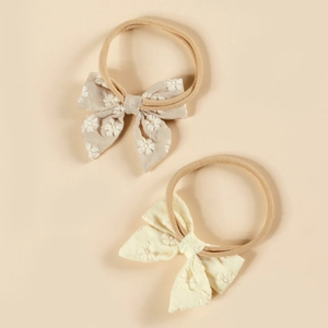 Lot de deux bandeaux pour bébé en nylon avec nœuds en coton brodés de fleurs blanches
