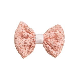 Elegant pink lace bow hair clip for girls featuring floral embroidery on white background