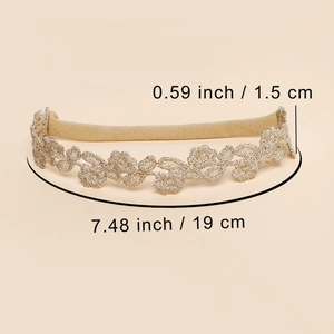 Détail d'un bandeau bébé en dentelle dorée avec dimensions indiquées en pouces et cm