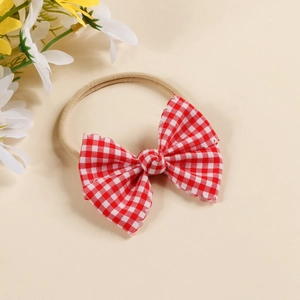 Sweet pink gingham bow baby headband with elastic nylon band for newborns and infants