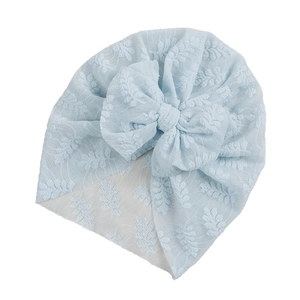 Elastic light blue lace baby turban hat with a large bow for toddlers and infants