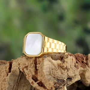 Men's gold-plated stainless steel ring with rectangular white shell inlay and textured band