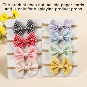Detailed set of eight colorful gingham bow headbands for babies with soft nylon bands