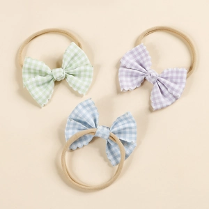 Three-piece baby headband set with pastel plaid bows and soft elastic nylon bands
