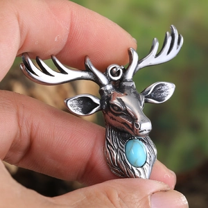 Retro stainless steel stag head pendant with turquoise stone inlay in punk rock style