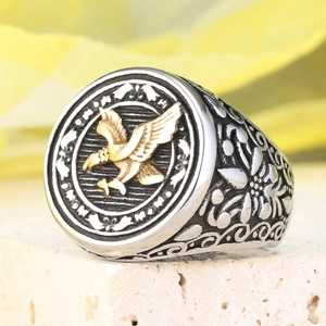 Vintage stainless steel eagle ring with gold relief and silver floral engravings on stone