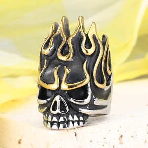 Punk vintage skull ring in stainless steel with golden flame accents for men