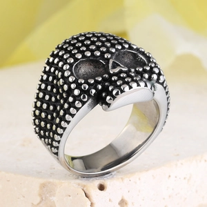Vintage gothic skull ring in silver stainless steel with punk texture and dark accents