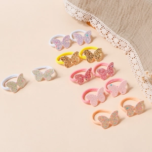 Dettaglio di elastici per capelli a farfalla glitterati per bambine in vari colori