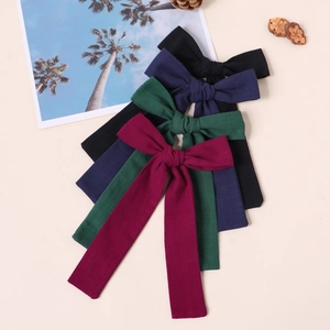 Detailliertes Set großer Haarspangen mit Schleifen in Schwarz, Navy, Grün und Weinrot