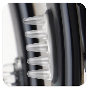 Macro detail of soft silicone bristles and durable black frame on high-quality hair claw