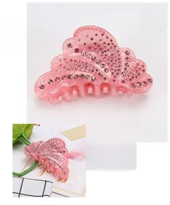 Pink acrylic butterfly hair claw with rhinestones, 9.5x4.5cm size and 36g weight details