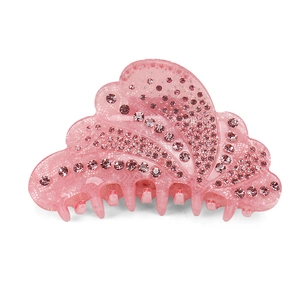 Detailed side view of pink resin hair claw clip with sparkling rhinestones and grid texture