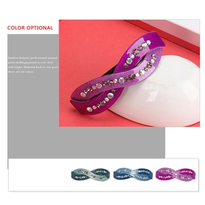 Elegante fermaglio per capelli in acetato con strass colorati su supporto in ceramica