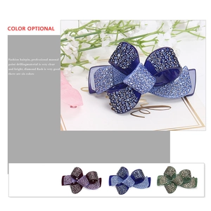 Elegant acrylic bow hair clip with sparkling rhinestones in deep blue and mixed colors