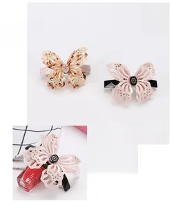 Detailed view of rhinestone butterfly hair clip with size 8x6.5cm and weight 24g