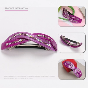 Elegante fermaglio per capelli in resina viola con file di strass colorati e molla in metallo