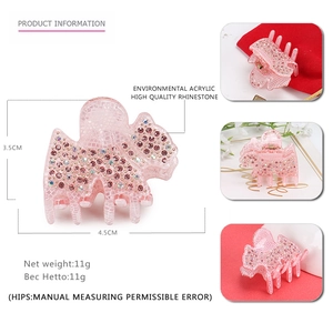 Petite pince à cheveux rose en acrylique avec strass brillants en forme de poney