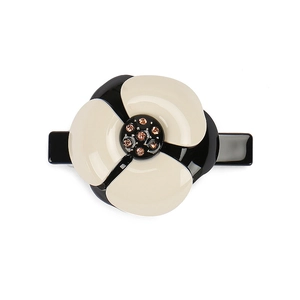 Barrette à cheveux camélia élégante avec pétales noir et blanc et centre en cristal