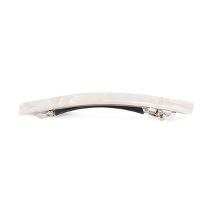 Detail showing cream pearl texture acetate hair clip with silver metal spring mechanism