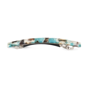 Detailed close-up of blue marble pattern acetate spring hair clip with silver metal base