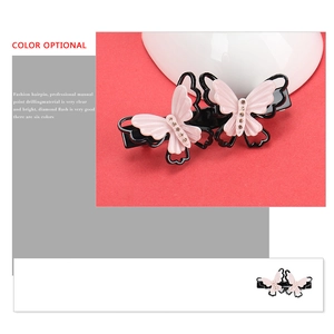Barrette papillon rose en acétate avec strass pour des coiffures élégantes