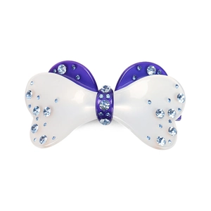 Dettaglio del fermaglio per capelli a fiocco in acrilico con strass blu e viola