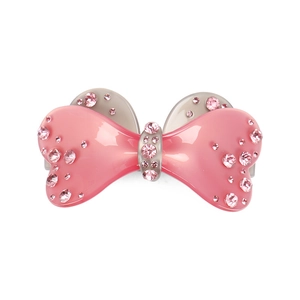 Dettaglio della clip per capelli in acrilico con strass rosa e silhouette a orecchie