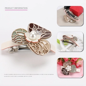 Elegant camellia acetate hair clip with butterfly design, pearls and crystals