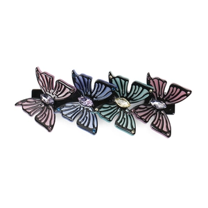 Rainbow acetate butterfly hair clip with colorful crystals and marquise gems