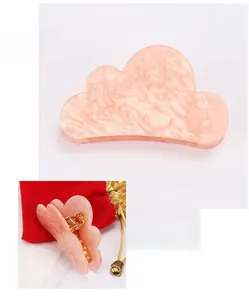 Cloud shape acrylic hair claw with pink marble texture and Austria diamond details