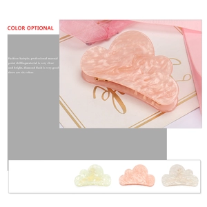 Cloud shaped acetate hair claw clip with marble texture and pearlescent finish
