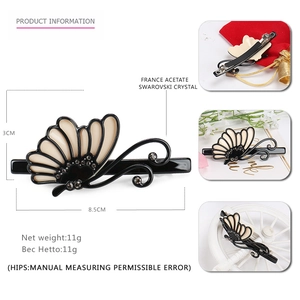 Elegant black acetate butterfly hair clip with crystals and spring closure mechanism