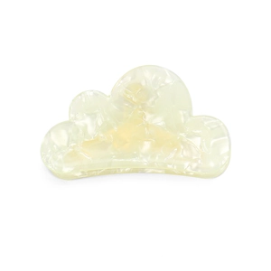 Detailed view of the cloud-shaped hair claw with cream marble texture and acetate finish