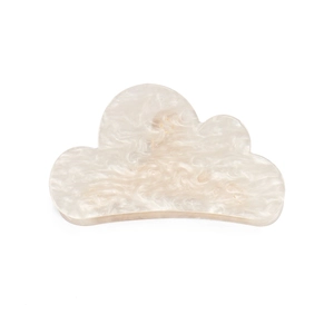 Detail shot of cloud-shaped hair claw with pearlescent white marble texture finish