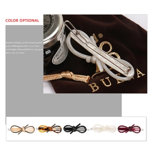 Elegant bow-shaped acetate hair clips for women in six classic colors with sparkling crystals